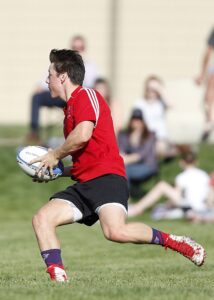 man-playing-rugby-at-daytime-159666